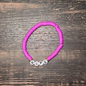 ⭐️5for25⭐️ Urban Outfitters Pink Hope Bracelet